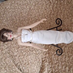 The " JACKIE DOLL." Elegant  with White Wrap and Pearl Necklace.
